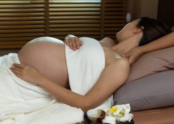 Maternity foot massage in spy ,treatment and relax.Healthy concept